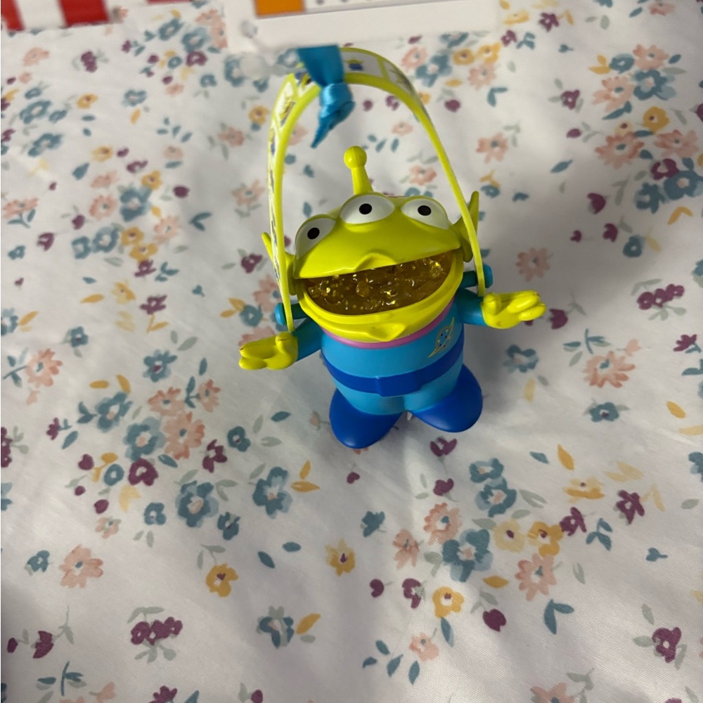 The claw alien  bucket toy story ornament accessory for labubu lights up Disney